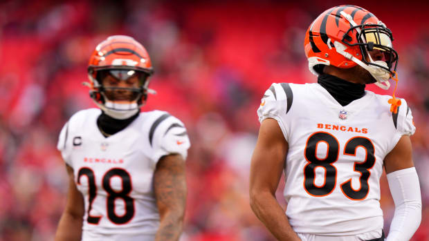 Cincinnati Bengals running back Joe Mixon (28), left, and Cincinnati Bengals wide receiver Tyler Boyd (83), right, warm up prior to a Week 17 NFL football game between the Cincinnati Bengals and the Kansas City Chiefs, Sunday, Dec. 31, 2023, at GEHA Field at Arrowhead Stadium in Kansas City, Mo.